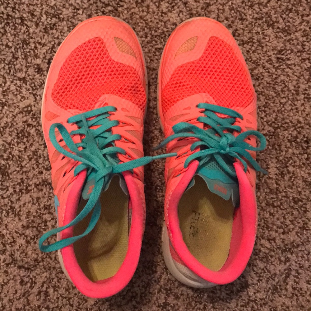 Pink/blue Nike Frees 5.0